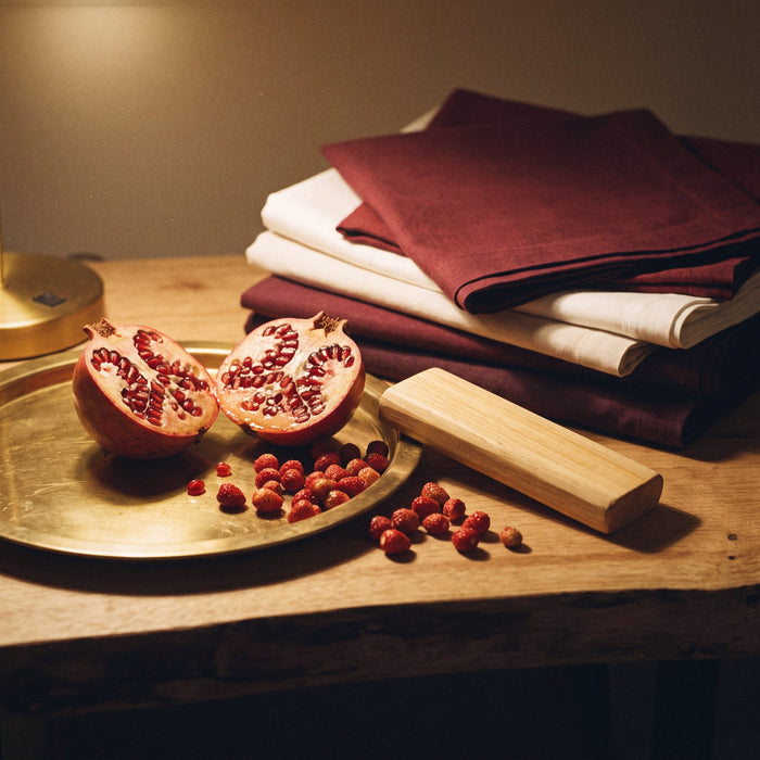Berry Dangerous — pomegranate, wild strawberry and sandalwood beside freshly folded linens, by lamplight